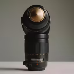 the bottom view of a lens on a white surface