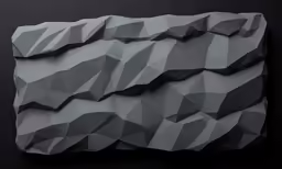 an artistic piece made of grey paper