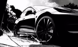 the wheels on the rear of a sports car