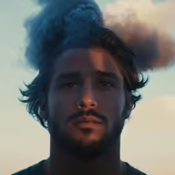 a man with a large smoke stack in his head