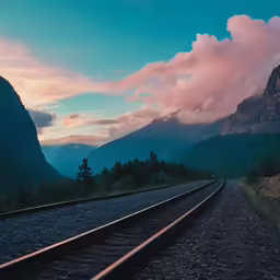 the landscape looks so stunning as it glows with pink, yellow and blue clouds