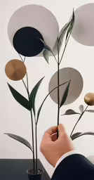 an arrangement of decorative vases sitting on top of a table
