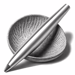 a silver ballpoint pen and dish on a white background