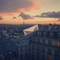 a city skyline at dusk with a kite in the air,a photo taken of an outdoor cityscape
