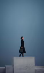 a woman is walking up steps looking up