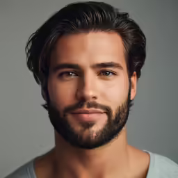 a man with long hair is posing for a portrait