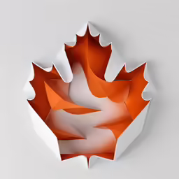 a white and red flower made out of paper