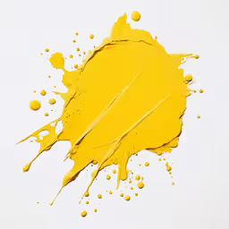 yellow ink spills on white paper while placed in front of the bottom of the image