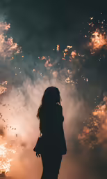 a person standing in front of a cloudy sky