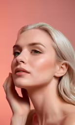 a blonde woman with makeup up posing for a photo
