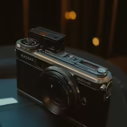 a small camera sitting on top of a table