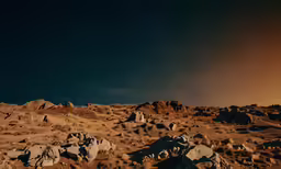 the desert covered with rocks and some hills