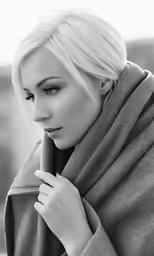 a woman is in black and white posing
