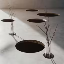 a group of vases sitting on top of a floor