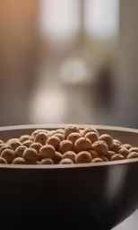 a bowl filled with a mixture of brown chocolate balls