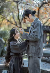 an older woman with long hair cutting another woman