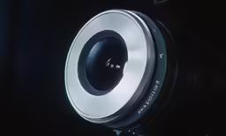 the lens is shown in dark and empty space