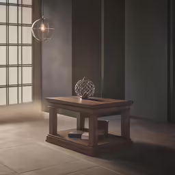 a wooden table with an artistic decoration on top