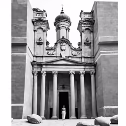 a black and white image of a very old building
