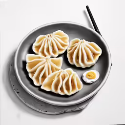 food on top of a plate with chopsticks