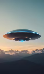 a strange flying object over a mountain range