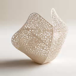 the intricate white vase is made from paper