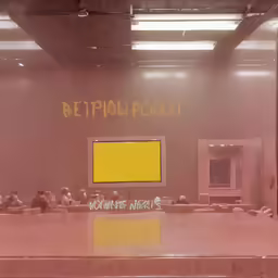there are some people sitting at a table