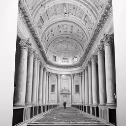 people walking in the center of an old church