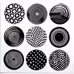 art print with a variety of black and white circles,six circles and three dots, each in black and white