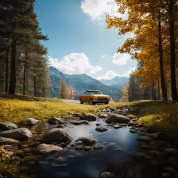 the truck is driving down the road by a river