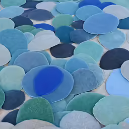 various colored felt shapes in the middle of the floor