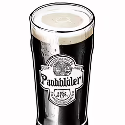 a black glass filled with liquid sitting on top of a table