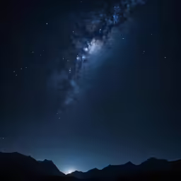 the night sky has stars and a milky