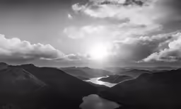 a photo taken from the top of a mountain looking down at some lakes