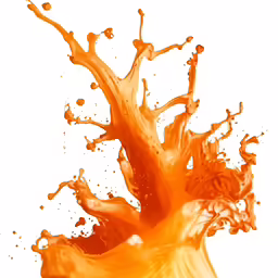 a glass of orange liquid is shown in this picture