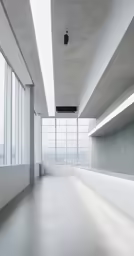 a large window sitting inside of an empty building
