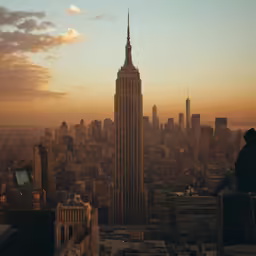 an aerial view of a cityscape at sunset