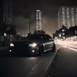 a car sitting at the curb on the street