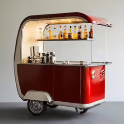 a small red vending cart is seen here