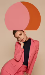 a woman in a pink jacket and black shirt