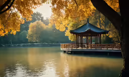 a small gazebo on the edge of a body of water
