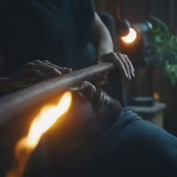 a man is on his cell phone in the dark