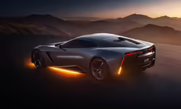 a grey car driving through the desert with mountains in the background