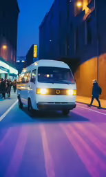 the bus is driving through the city at night