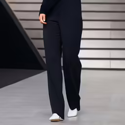 a woman is on a runway wearing an outfit