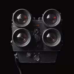 a camera sitting on top of a black background