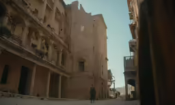 an image of a person on a dirt street