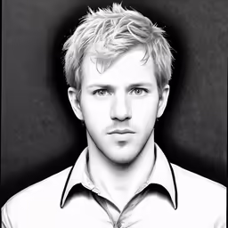 a young man is looking at the camera