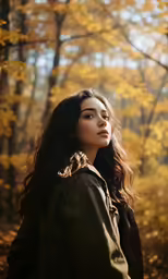 a woman in the woods with an autumn scene