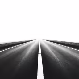 a line on an empty highway during a very long day